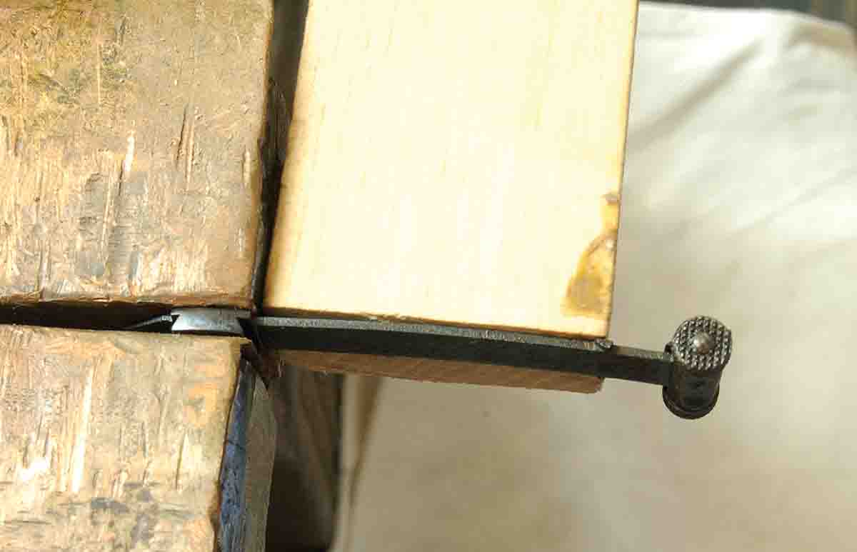 Repairing the sight arm requires bending it using a wood block cut to fit the arm. Go slow.